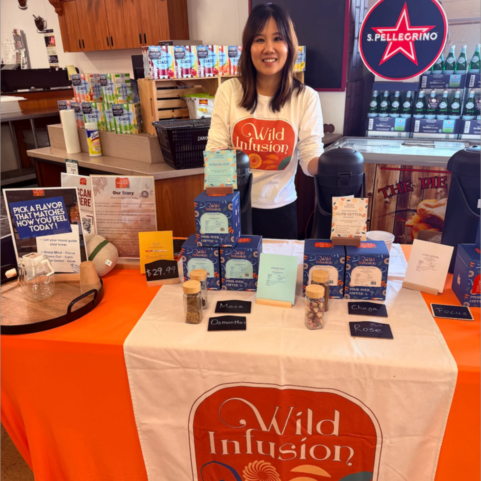 Shelley Tseng sampling Wild Infusion Coffee at an in-store tasting table