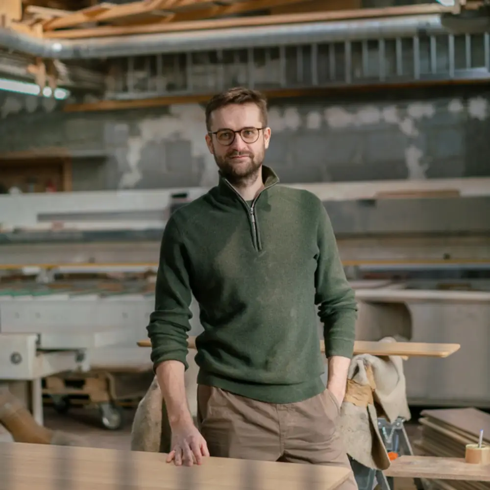 Oakywood founder Mateusz Haberny in his workshop
